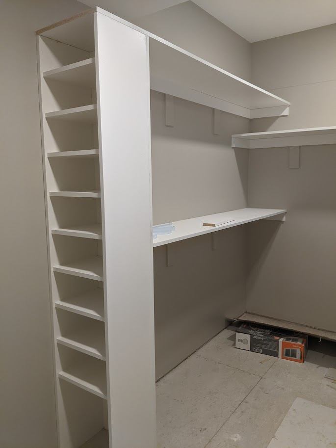 Mudroom shelving tower being installed