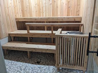 Outdoor cedar-slat built-in bench seating nook