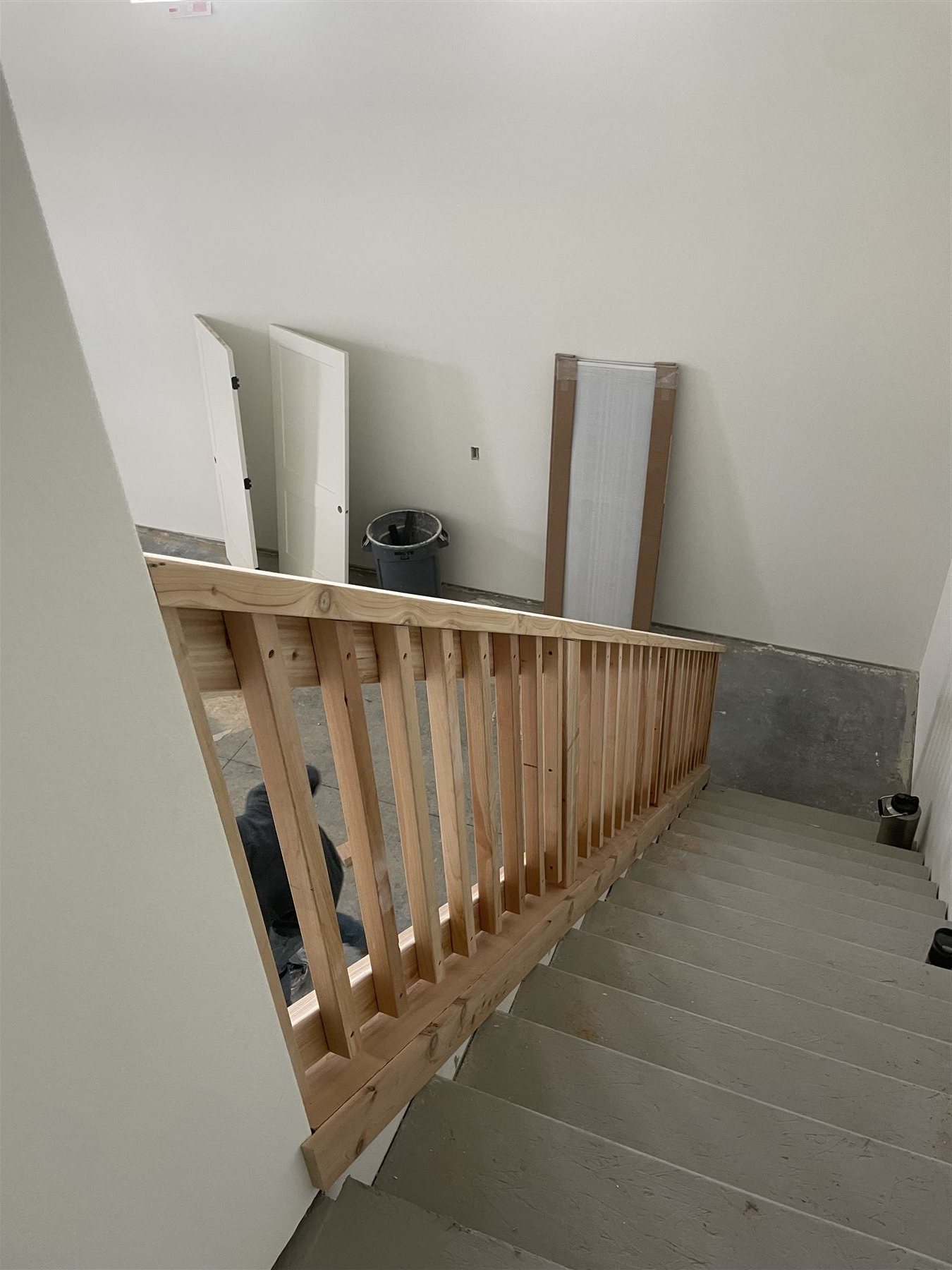 Wood stair railing under construction